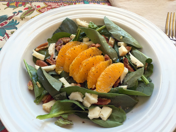 Fava Leaf and Spinach Salad with Orange, Smoked Mozzarella, and Toasted Pecans